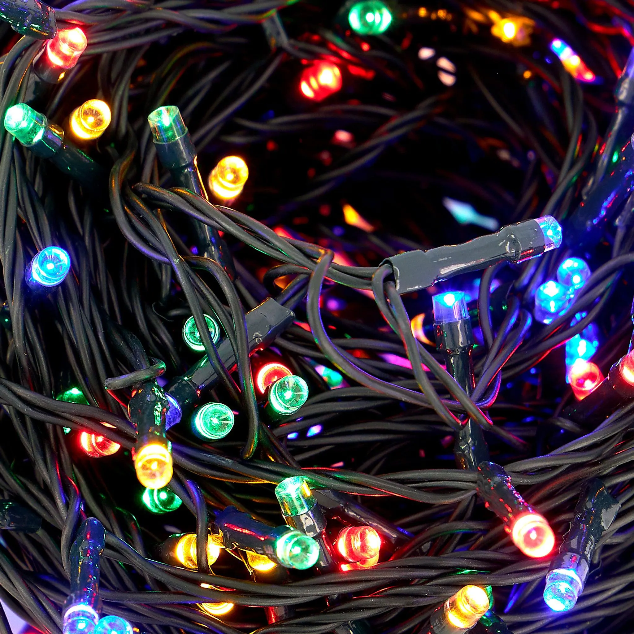 Indoor/Outdoor 8 Function LED Waterproof Fairy Lights with Green Cable (600 Lights - 46M Cable) - Multicoloured Lights