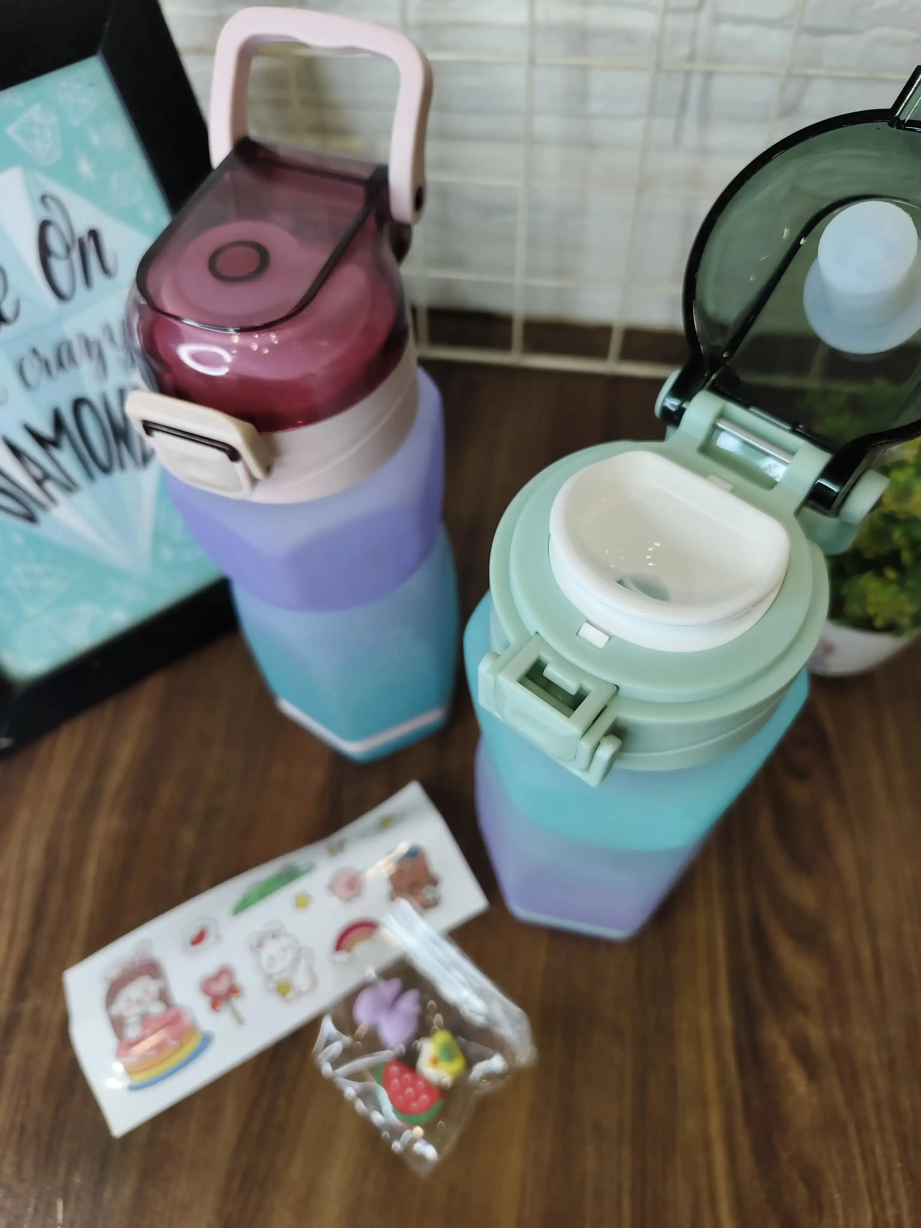 Ombre water bottles with stickers and charms