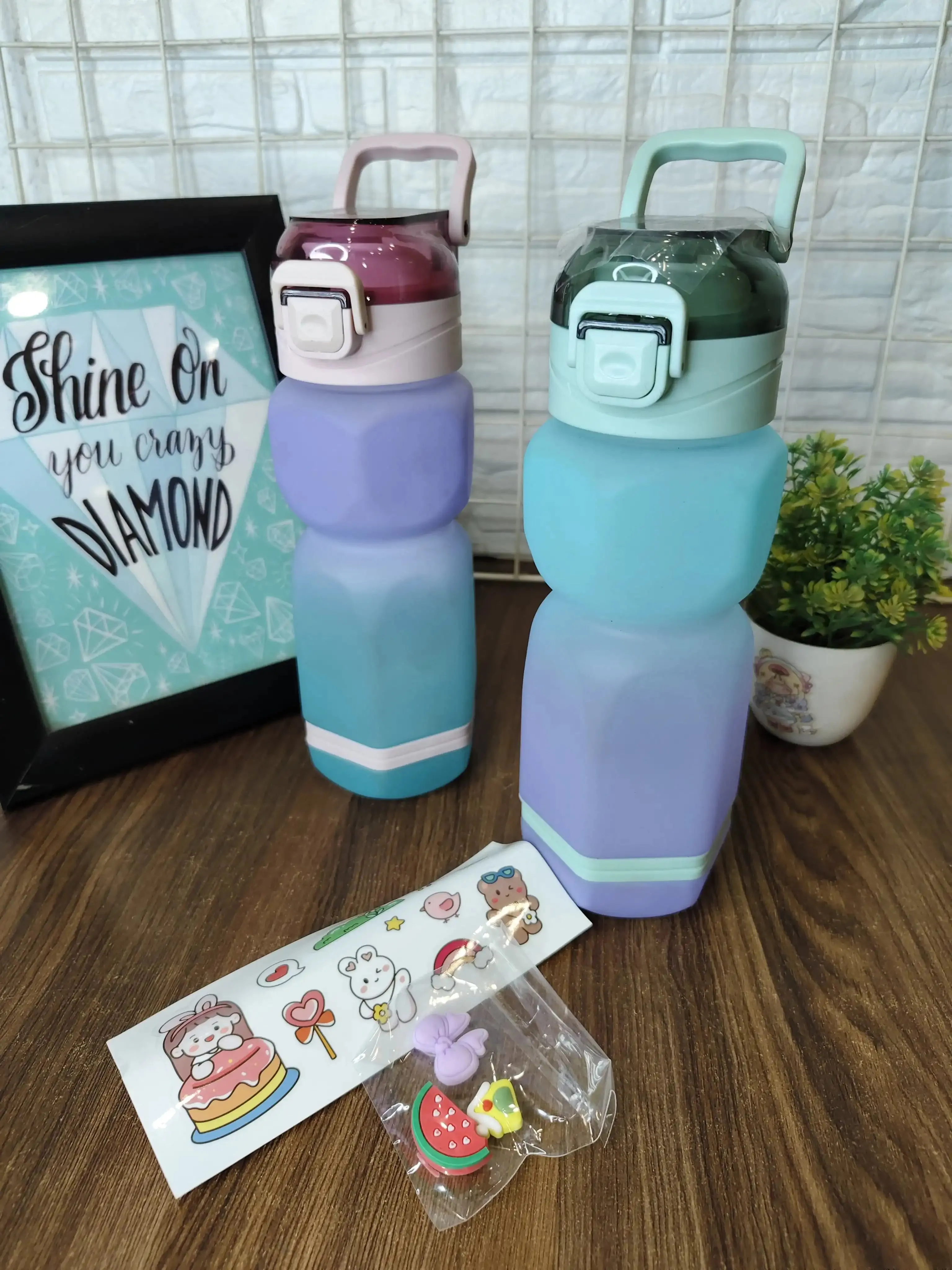 Ombre water bottles with stickers and charms